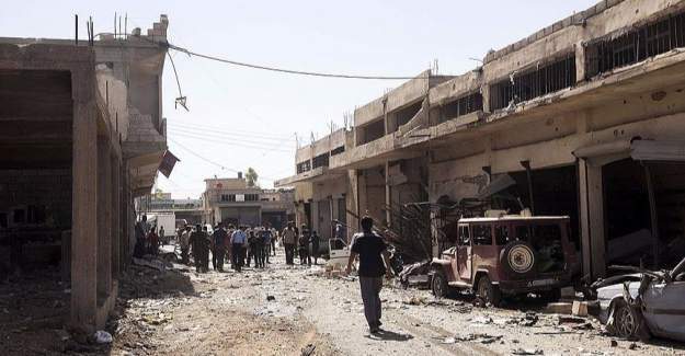 Suriye uçakları çarşı merkezini vurdu